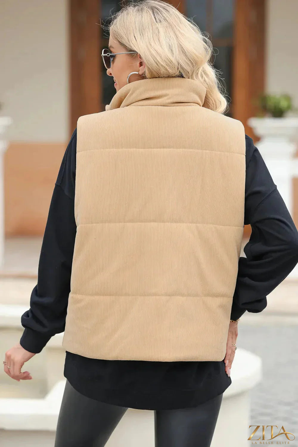 Trendsi pocketed zip-up turtleneck vest coat featuring a cozy design and front pockets, perfect for layered winter style.