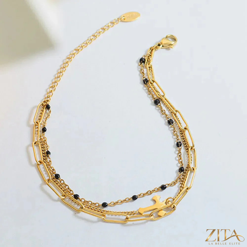 Titanium steel three-layered bracelet with sleek design, featuring interlocking bands, by Zita La Belle Elite.