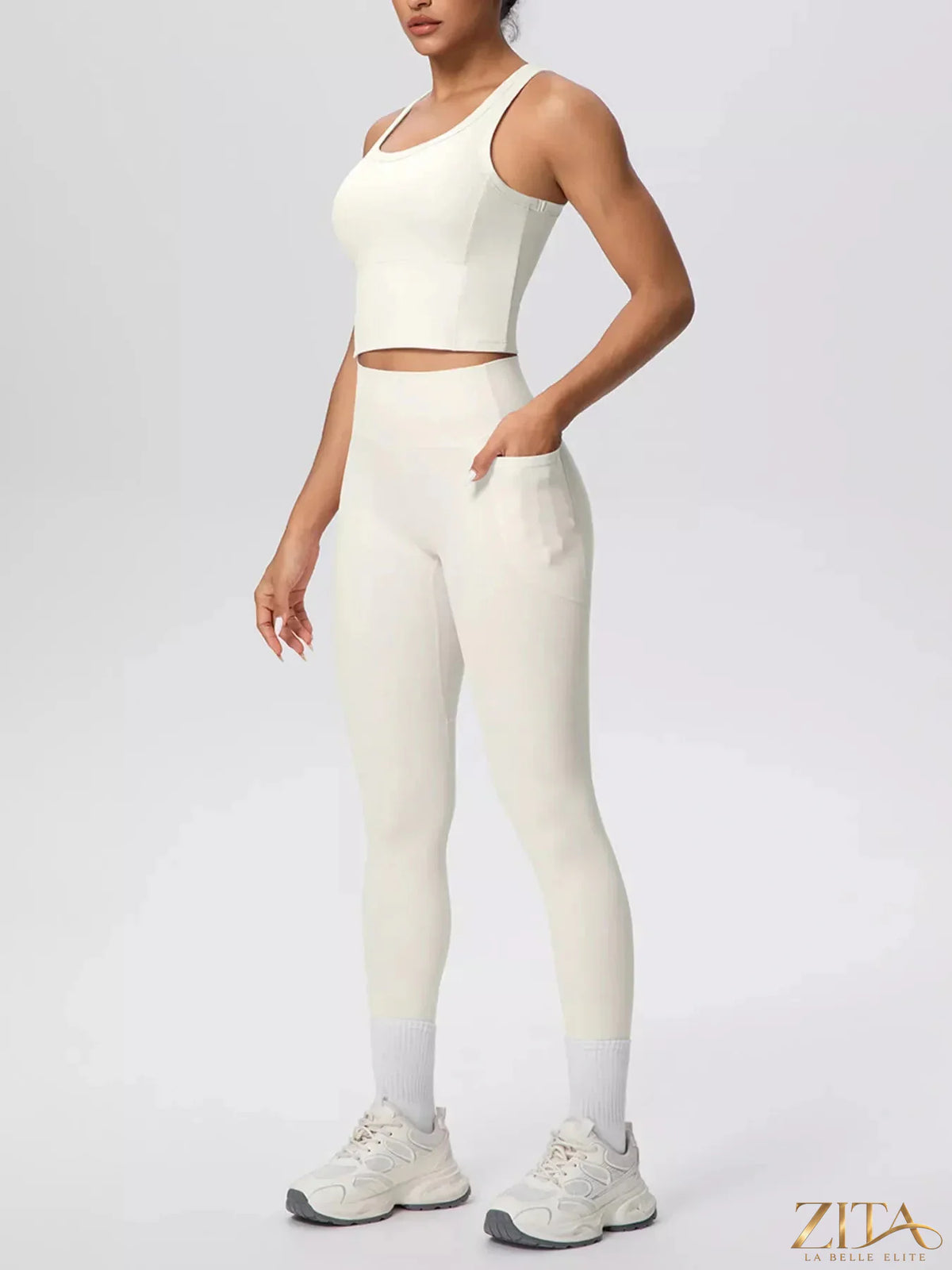 Zita La Belle Elite scoop neck tank and high-waisted leggings active set, in black, displayed on a model for workout or casual wear.