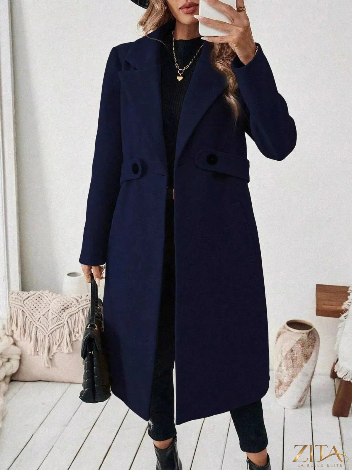 Longline coat with single button closure from Zita La Belle Elite, shown in a stylish, lightweight design suitable for layering.