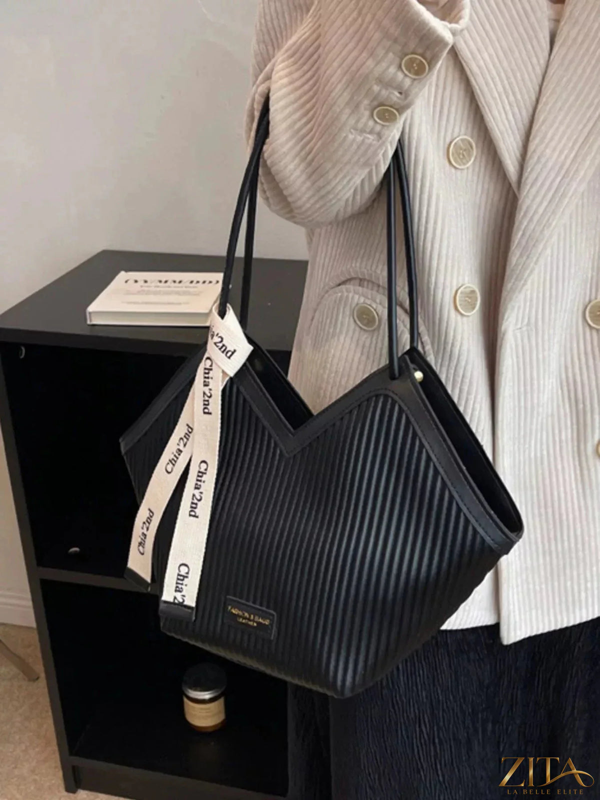 Textured leather shoulder bag by Zita La Belle Elite with a stylish design and adjustable strap.