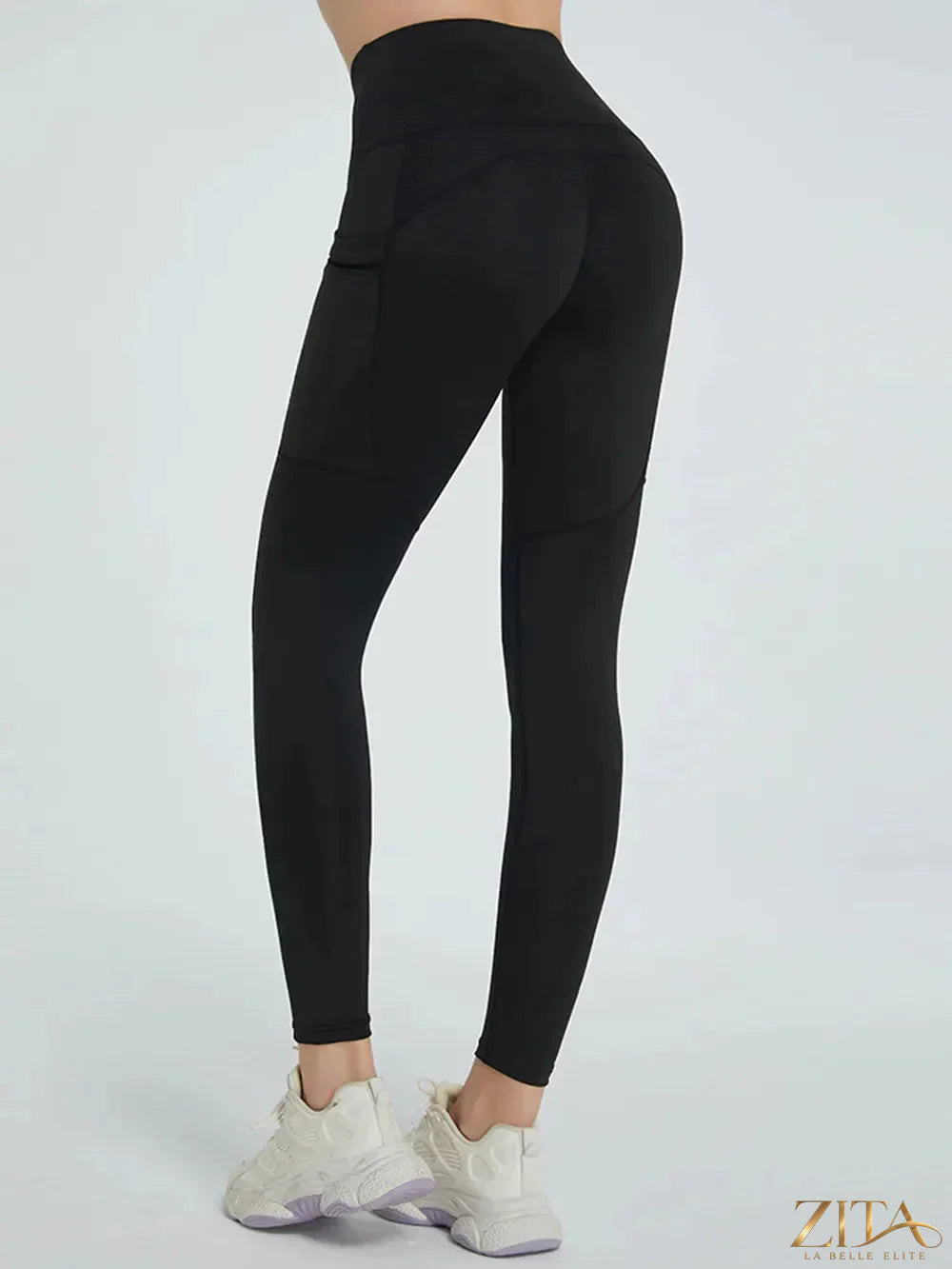 High waist active leggings by Trendsi, featuring a snug fit, stretchy fabric, and a sleek design for workout and casual wear.