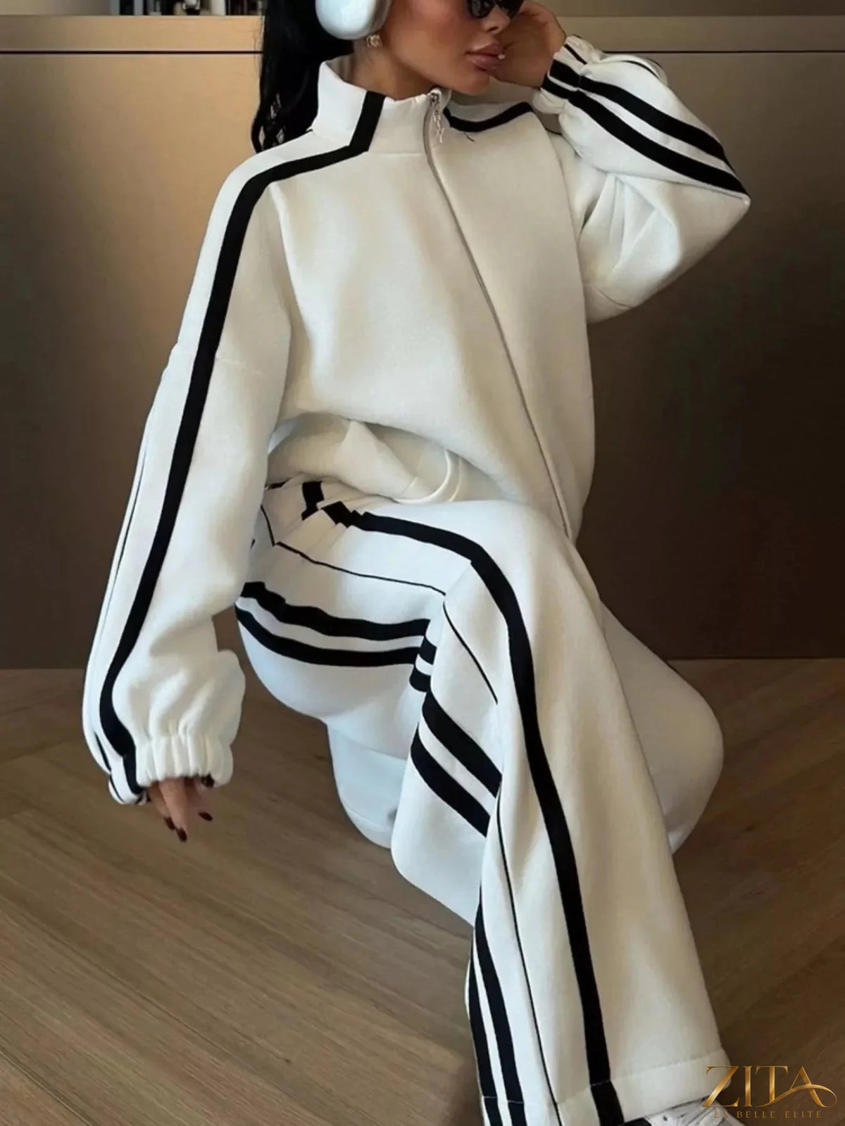 Zita La Belle Elite side stripes zip-up top and matching pants set, navy blue with white side stripe details.