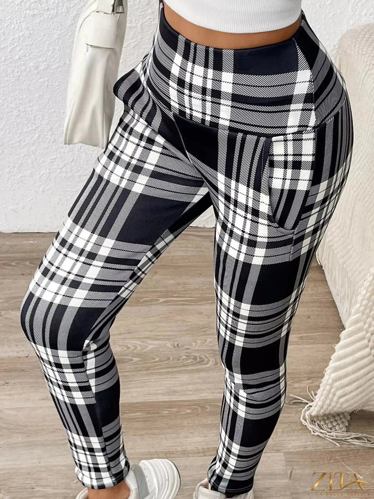 High-waisted plaid slim-fit leggings by Trendsi, featuring a stylish checkered pattern and comfortable stretch fit.