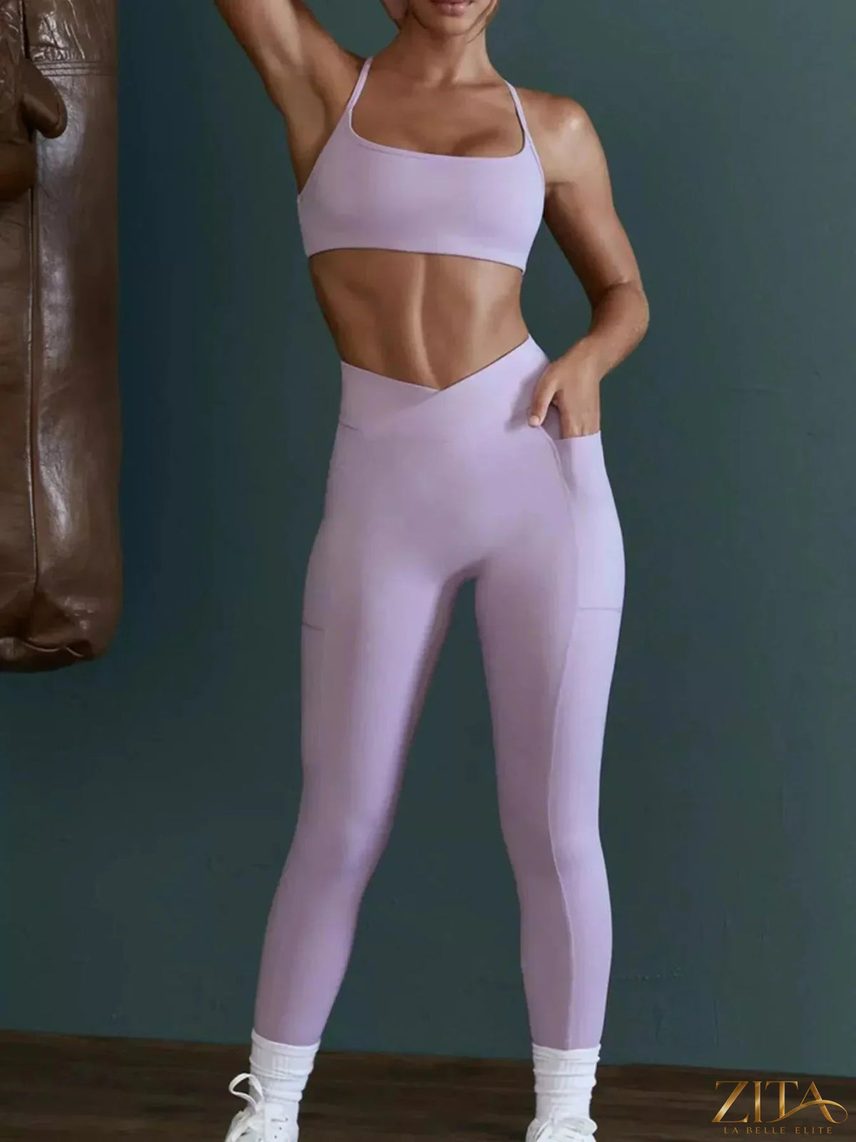 Zita La Belle Elite seamless cross-waist cami and leggings active set, black, form-fitting workout apparel, shown on model.