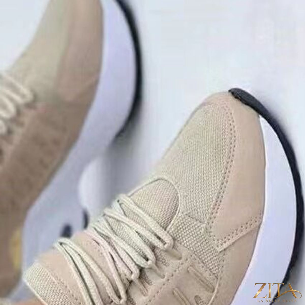 Zita La Belle Elite lace-up round toe sneakers with white and black design, casual footwear for everyday wear.
