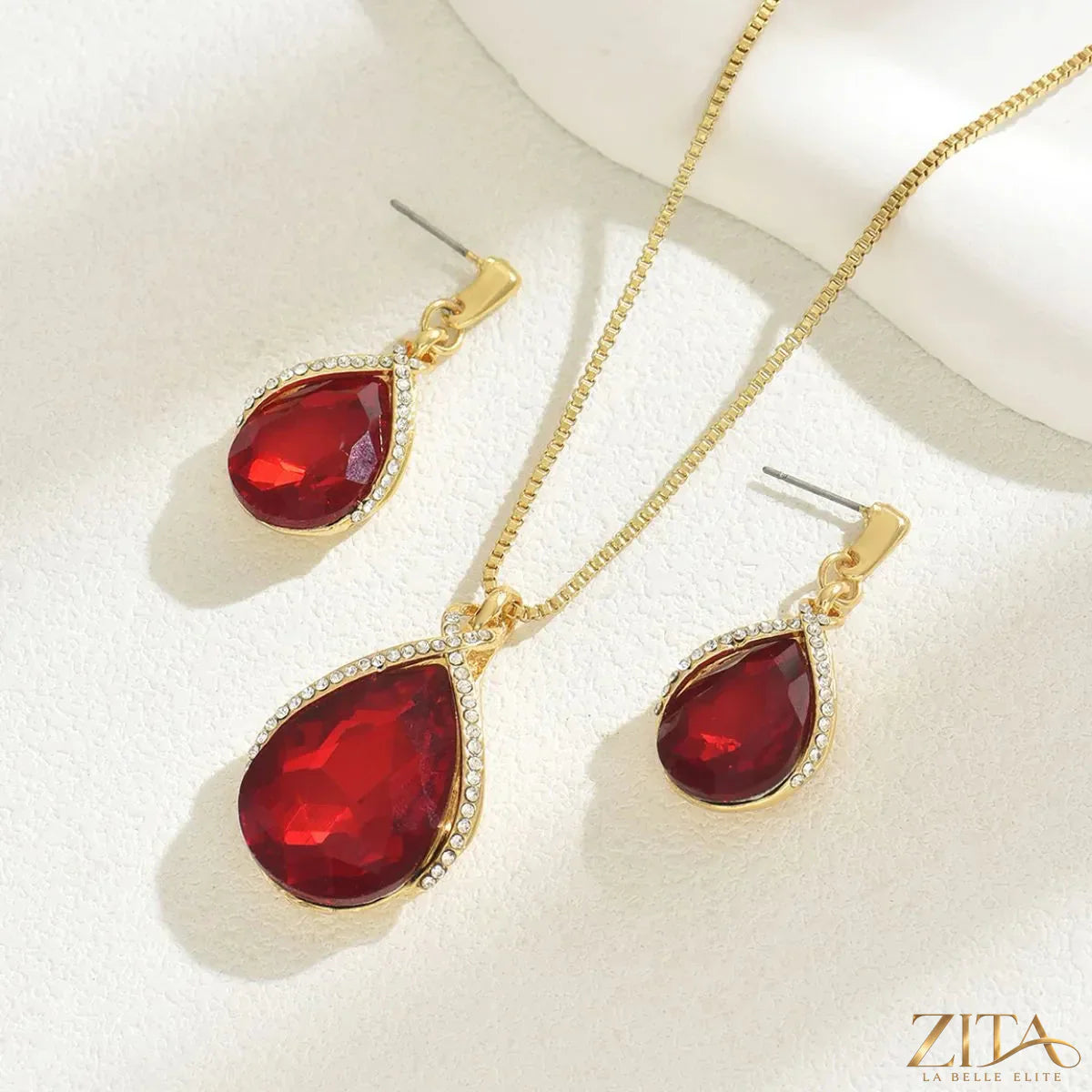 18K gold-plated rhinestone teardrop necklace and earrings jewelry set by Zita La Belle Elite, featuring sparkling teardrop design.