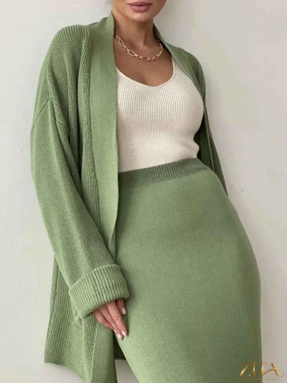 Zita La Belle Elite pocketed long sleeve cardigan and skirt sweater set, showing the cozy knit fabric and stylish design.