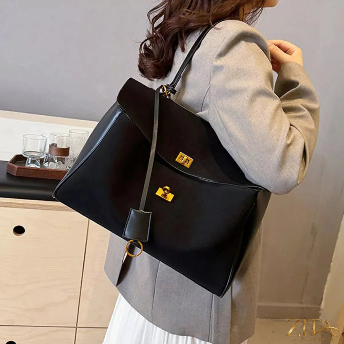 Trendsi PU leather shoulder bag with adjustable strap, featuring a smooth finish and sleek design for everyday use.