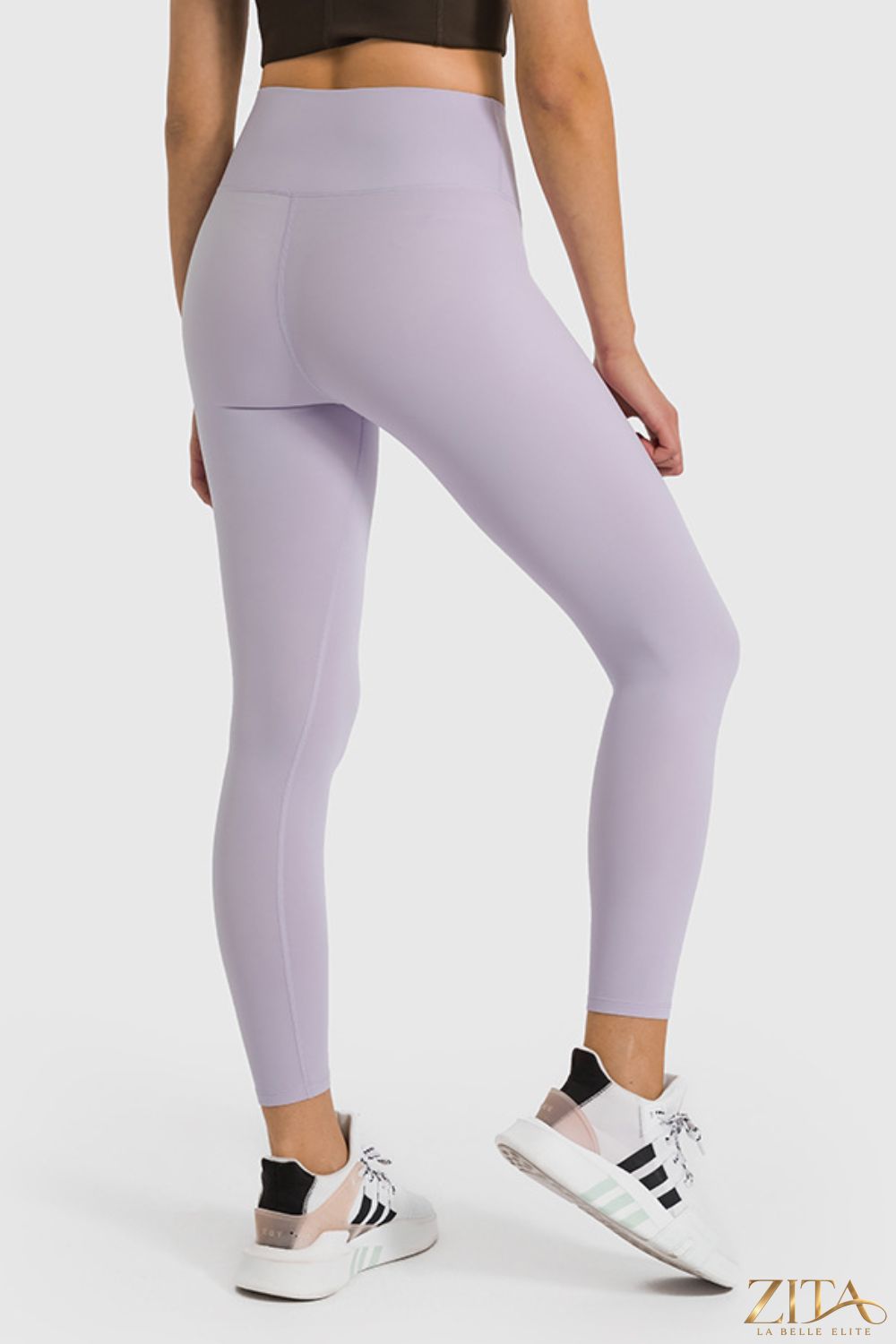 Zita La Belle Elite Millennia high waist ankle-length yoga leggings laid flat, showcasing their sleek fit and stretchy fabric.