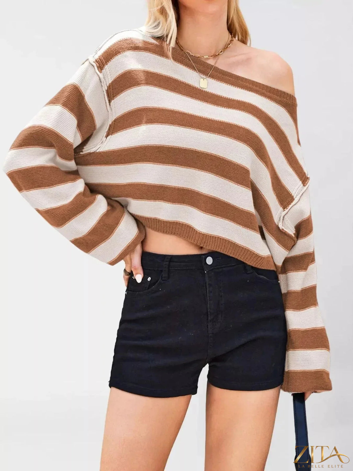 Striped boat neck sweater by Trendsi featuring a classic boat neckline and multicolor horizontal stripes, casual and stylish.