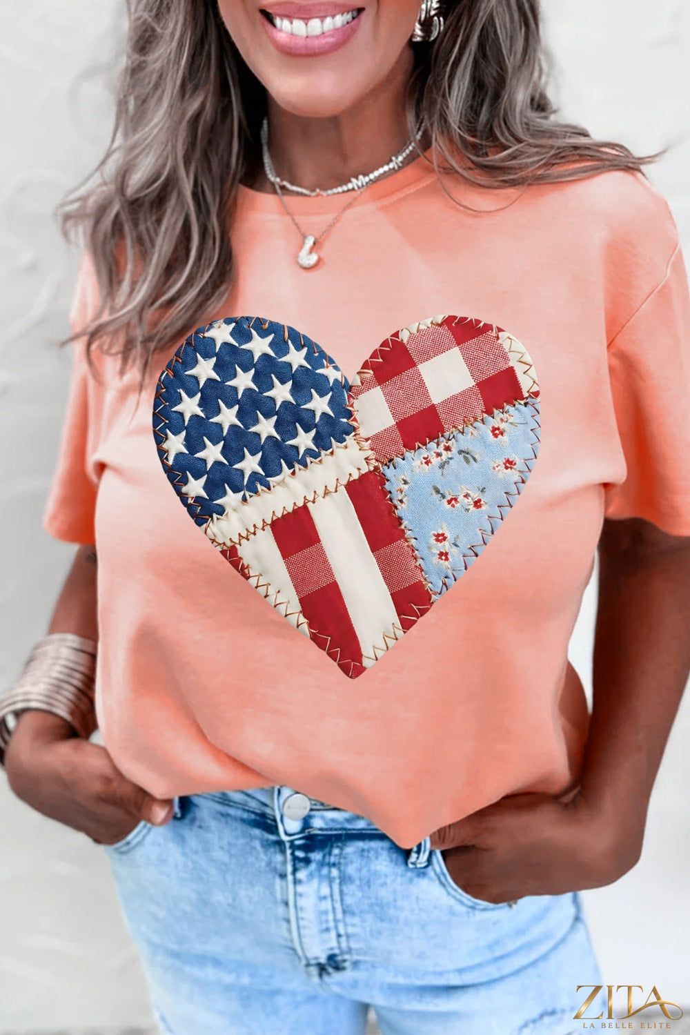 Red and white patriotic heart round neck T-shirt by Trendsi with star and flag design on soft cotton fabric.