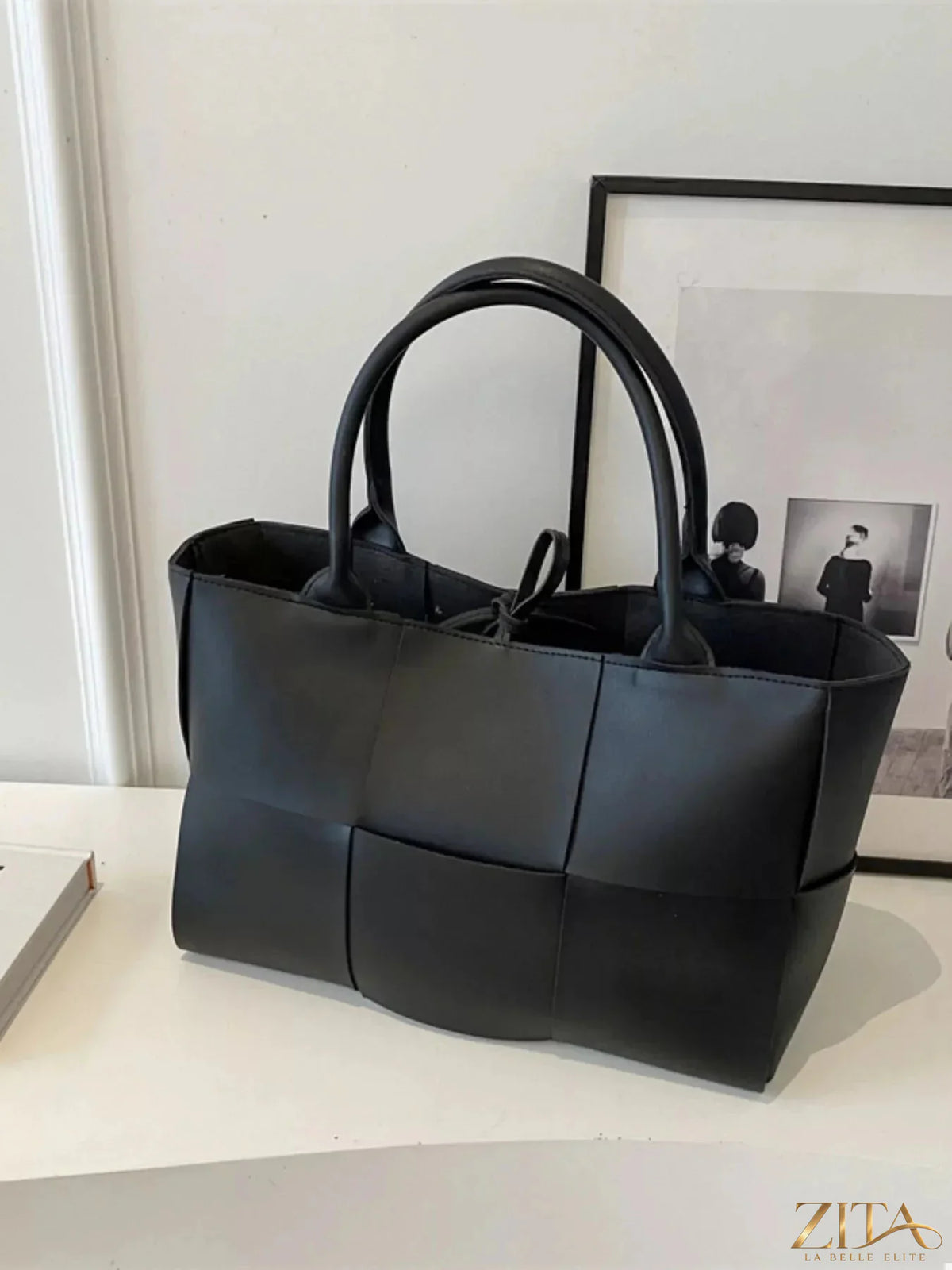 Woven leather tote bag by Zita La Belle Elite with sturdy handles and spacious interior, stylish and functional for everyday use.