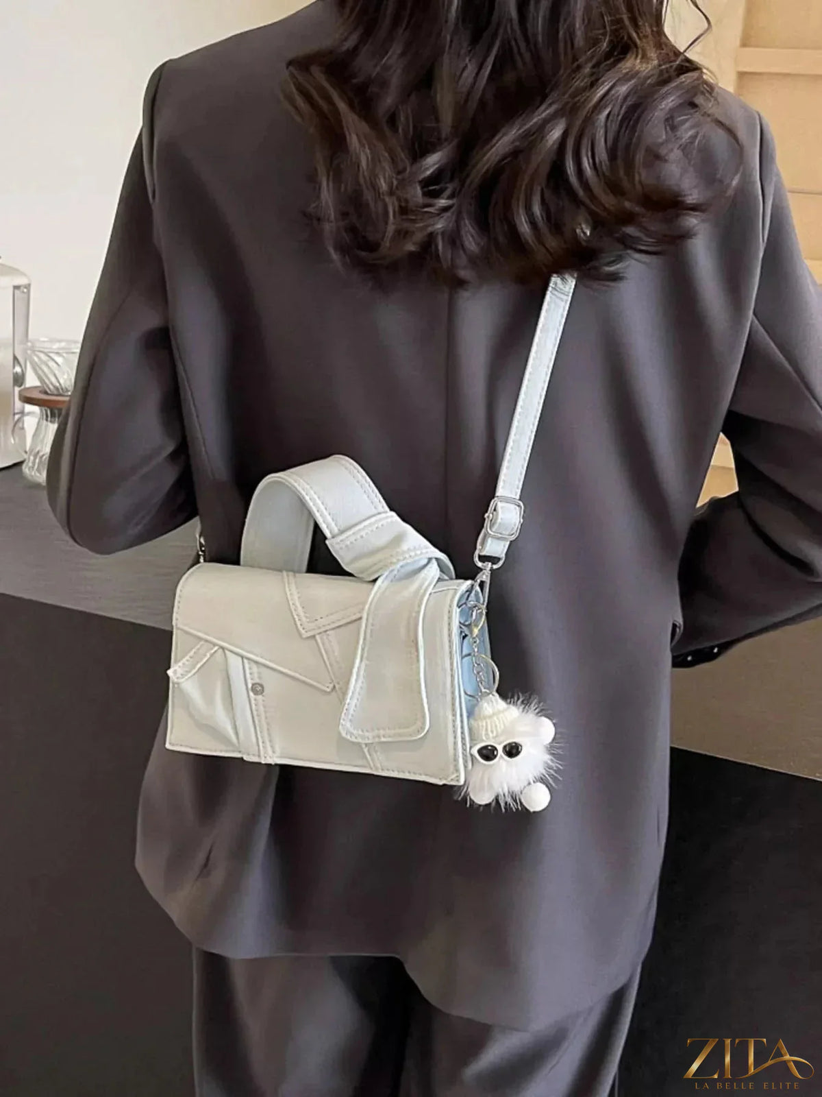 Zita La Belle Elite denim patchwork crossbody bag with mixed fabric panels and adjustable strap on white background
