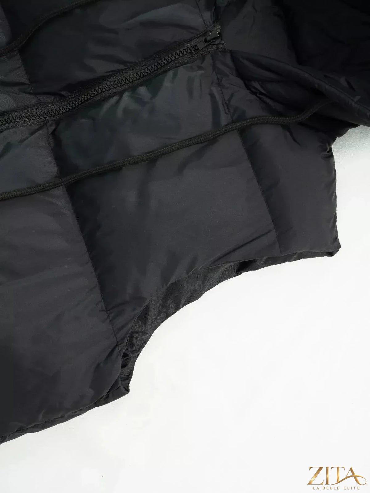 Zita La Belle Elite longline padded hooded vest coat, black, with quilted design and front zipper for warmth and style.