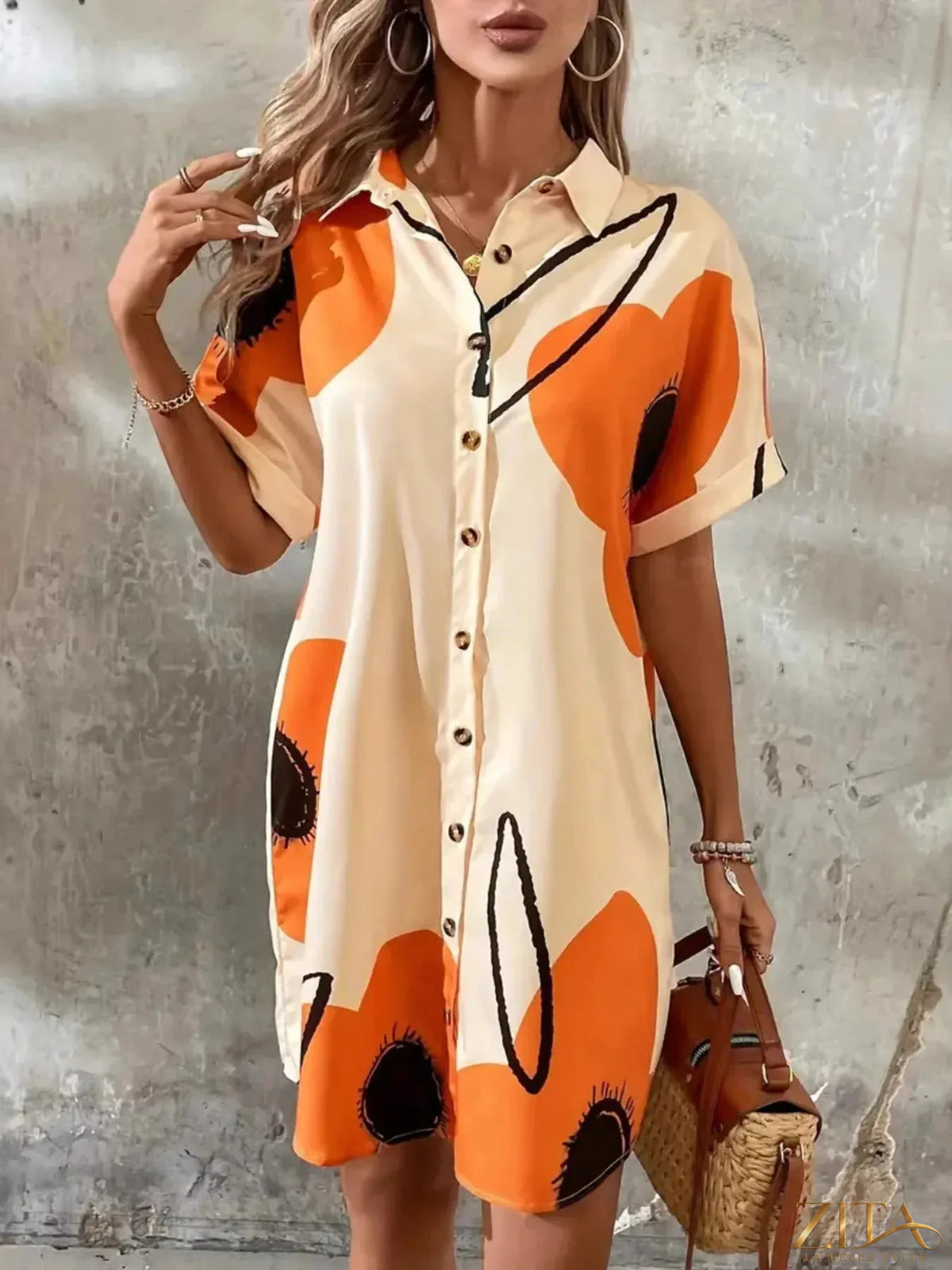 Printed button-front shirt dress by Zita La Belle Elite, featuring a stylish collar, long sleeves, and a vibrant floral pattern.