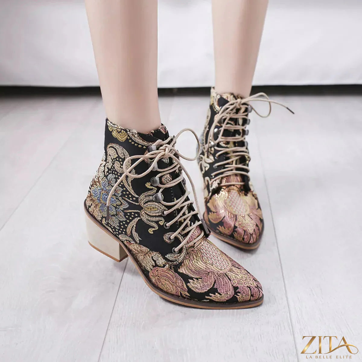 Zita La Belle Elite embroidered floral lace-up ankle boots with intricate lace details and floral embroidery on black leather.