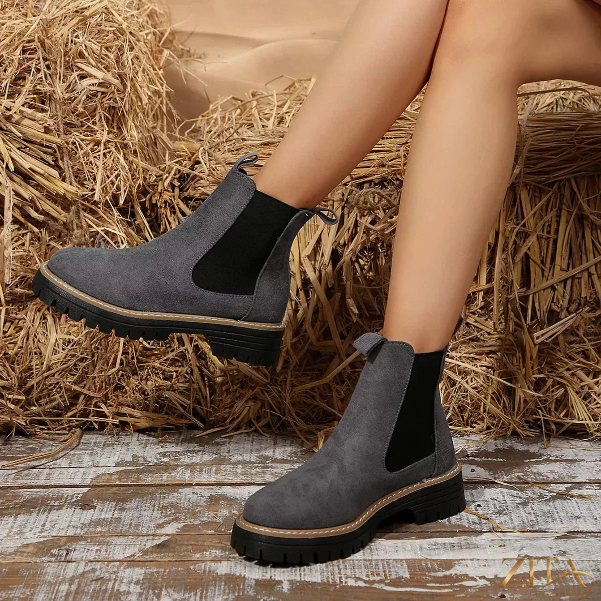 Zita La Belle Elite round toe platform boots with chunky heels and sleek black leather finish.