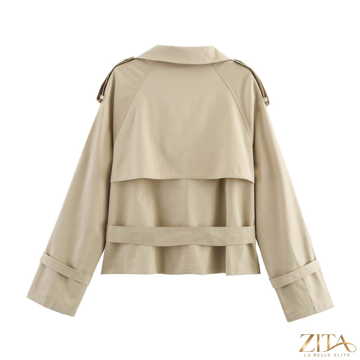 Women's short trench coat with notch collar and belt buckle detail by Zita La Belle Elite, shown in a stylish outerwear design.