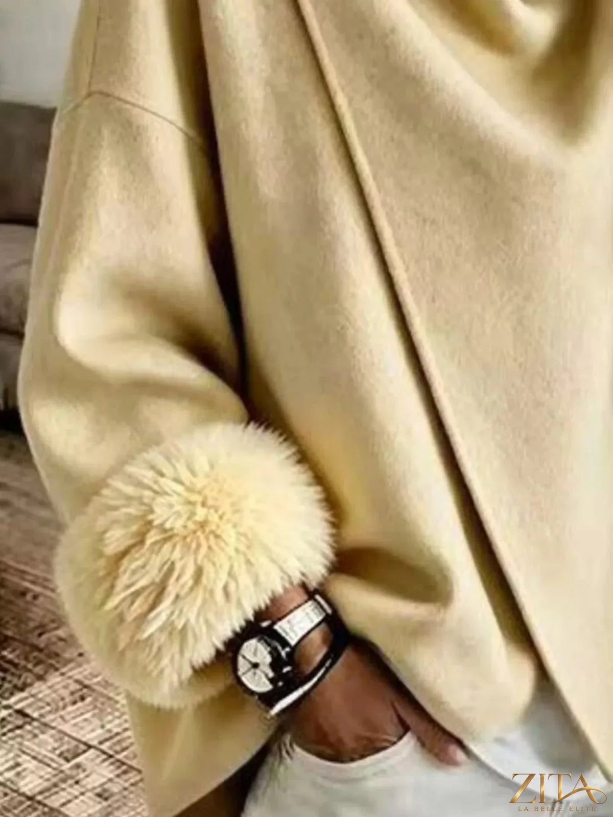 Plus size full-body outerwear by Zita La Belle Elite featuring elegant asymmetric faux fur cuffs and stylish design.