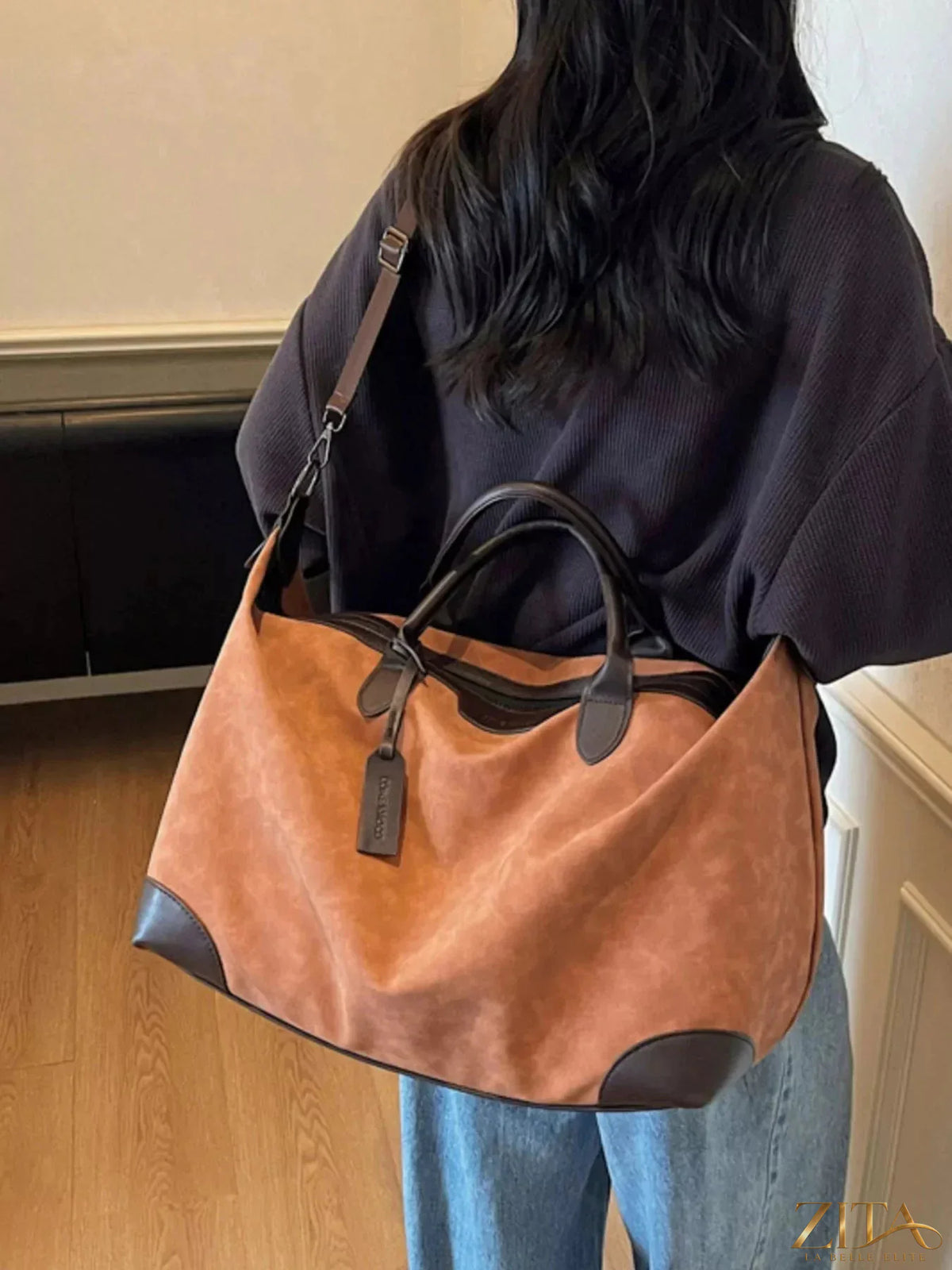 Vintage large capacity travel bag by Zita La Belle Elite featuring sturdy leather handles and spacious interior for travel essentials.