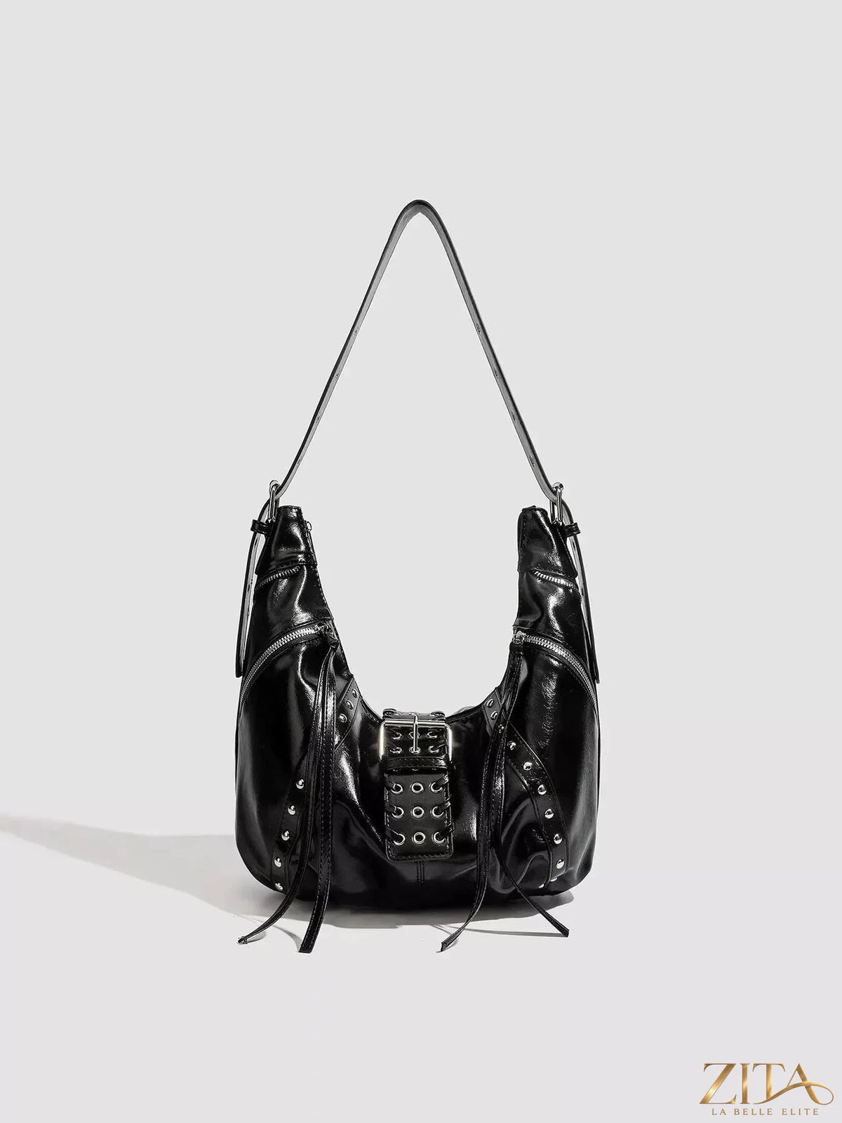 Zita La Belle Elite studded patent leather hobo shoulder bag with gold-tone hardware and spacious design.