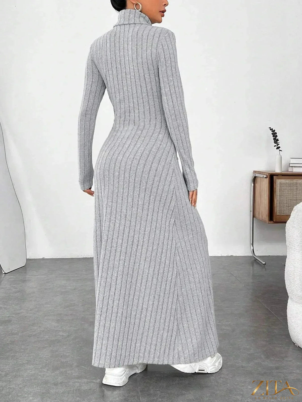 Ribbed turtleneck long sleeve maxi knit dress by Trendsi, featuring a fitted silhouette and soft ribbed fabric.