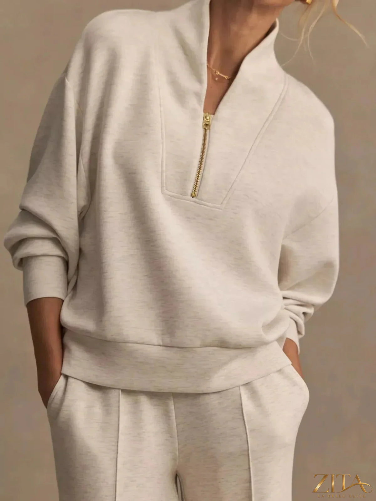 Zita La Belle Elite quarter-zip sweatshirt and wide-leg pants set, in cozy knit fabric, shown on a model.