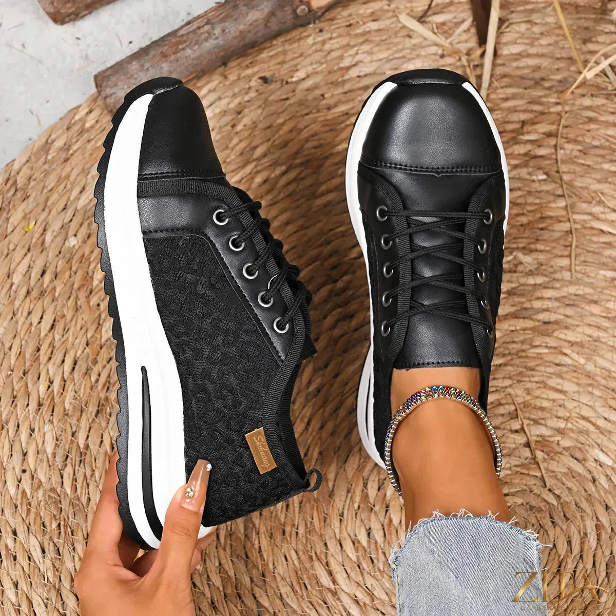 Zita La Belle Elite lace-up platform sneakers with chunky soles and white leather uppers, stylish and comfortable for casual wear.