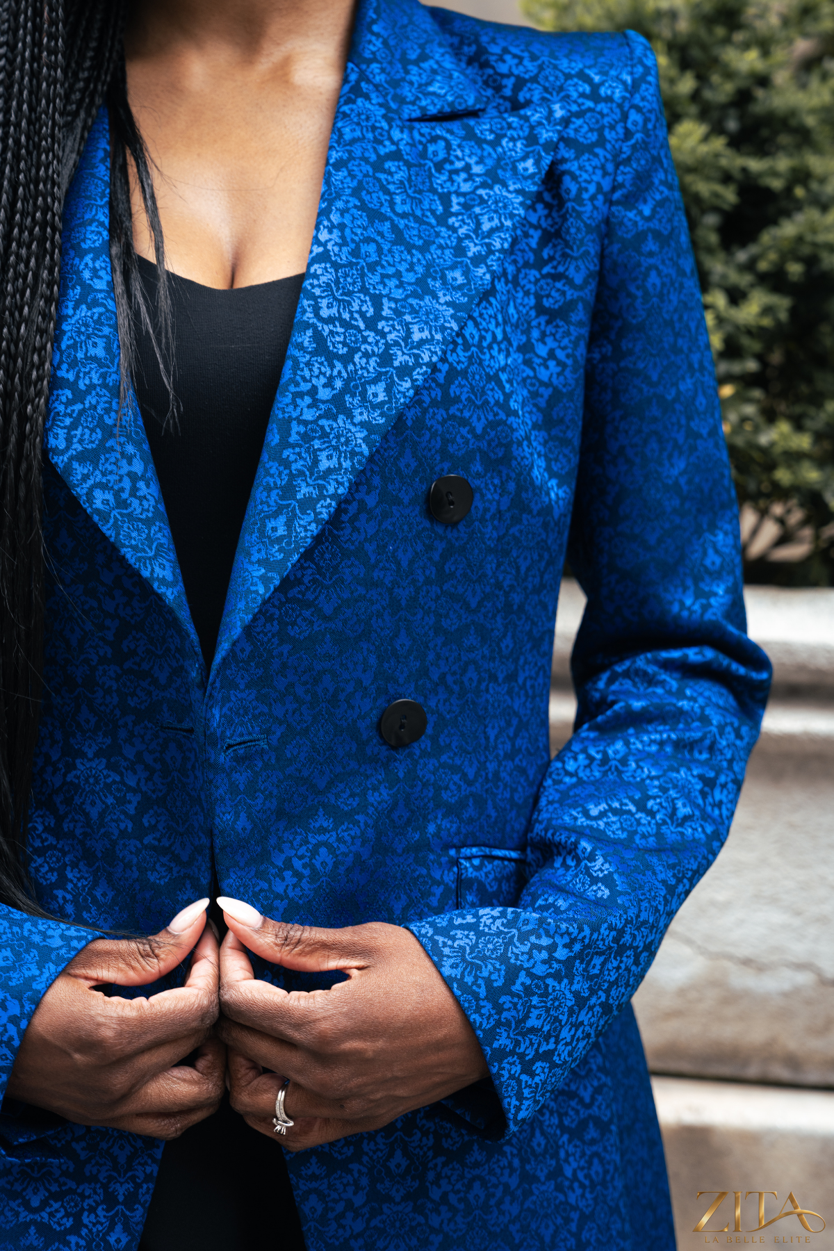 Zita La Belle Elite PREMIER blue blazer, tailored fit with lapel collar, shown on a hanger against a neutral background.