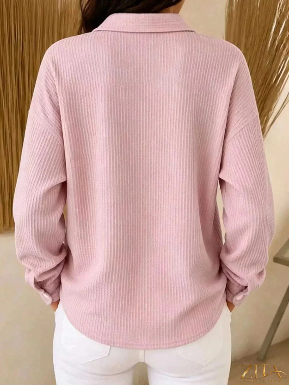 Waffle knit snap-down blouse from Zita La Belle Elite, featuring a stylish button-up front and textured fabric.