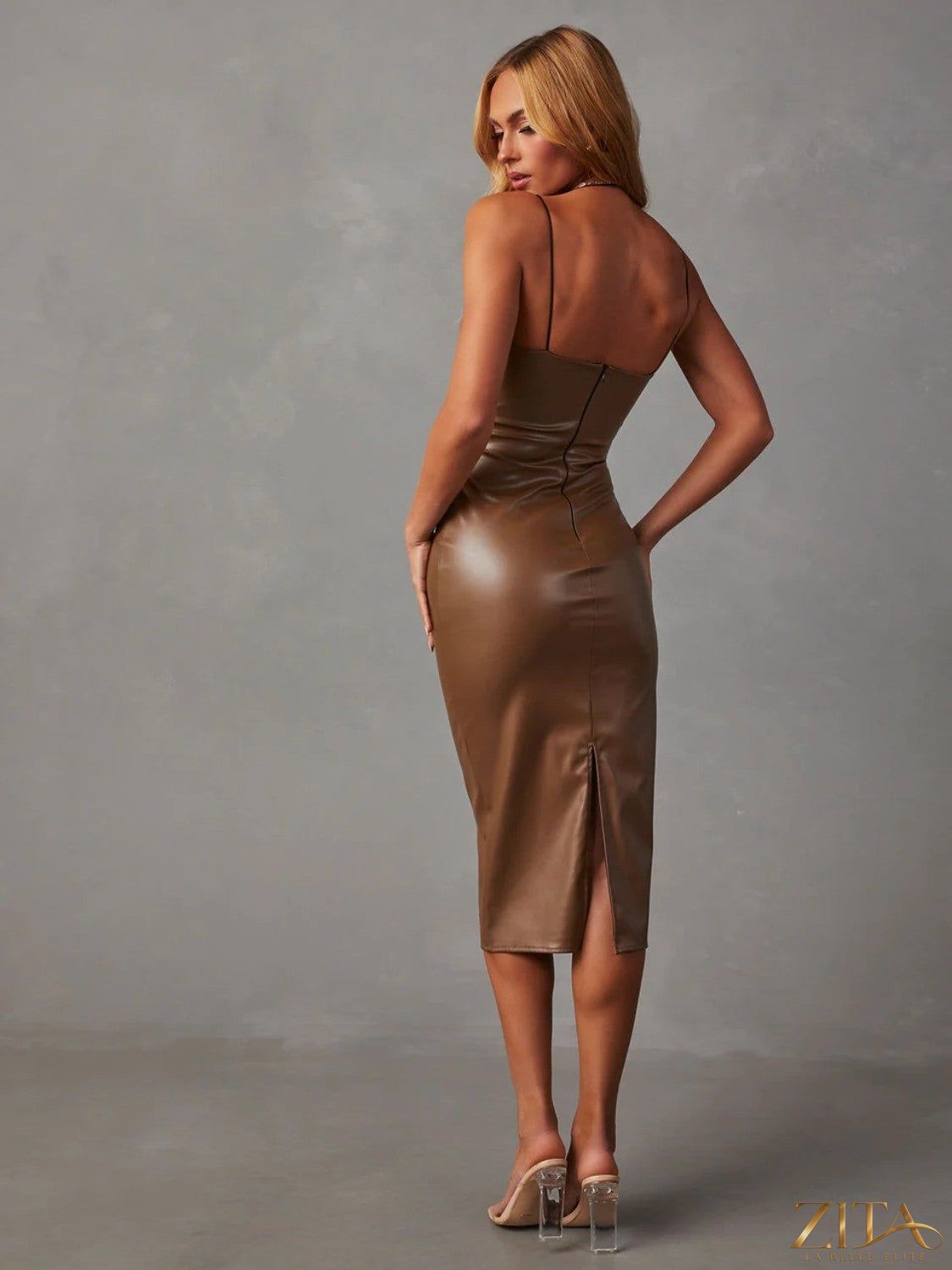 Zita La Belle Elite PU slit midi dress in black, featuring a fitted bodice, thigh-high slit, and elegant midi length.