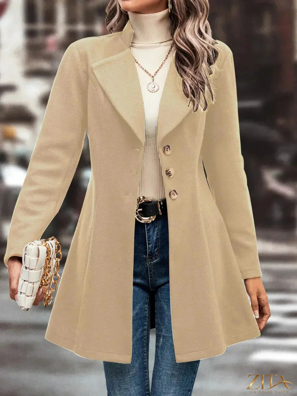 Zita La Belle Elite button-up longline coat in neutral fabric, featuring a tailored fit and classic collar design.