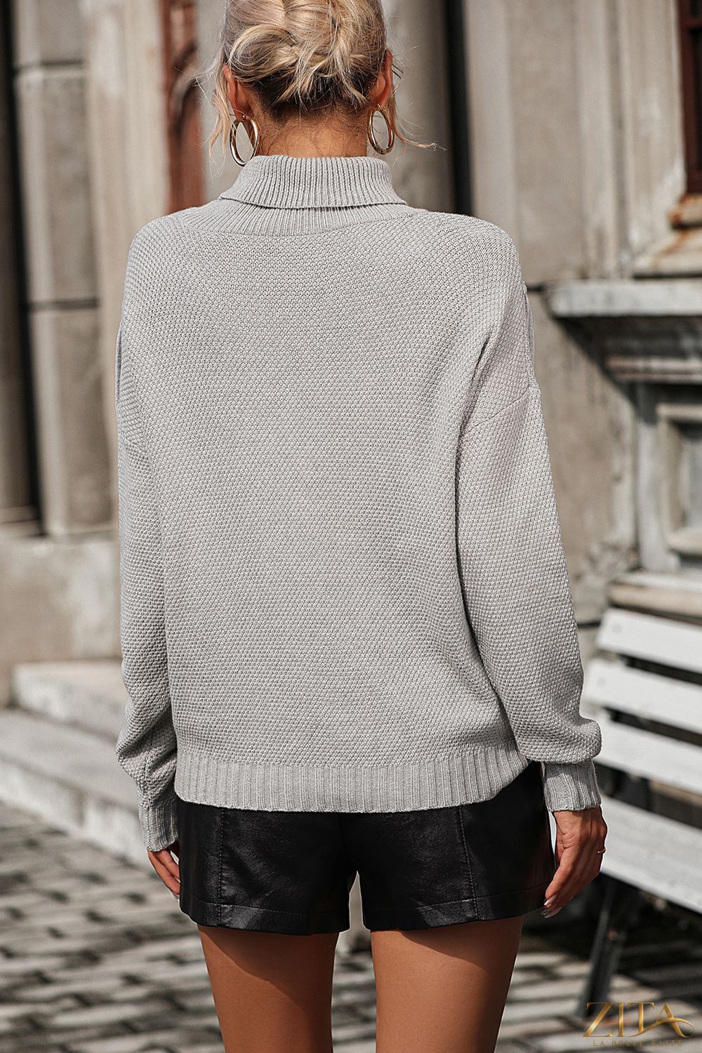 Trendsi turtle neck long sleeve sweater with tassel front, cozy pullover in soft knit fabric, stylish and comfortable winter top.