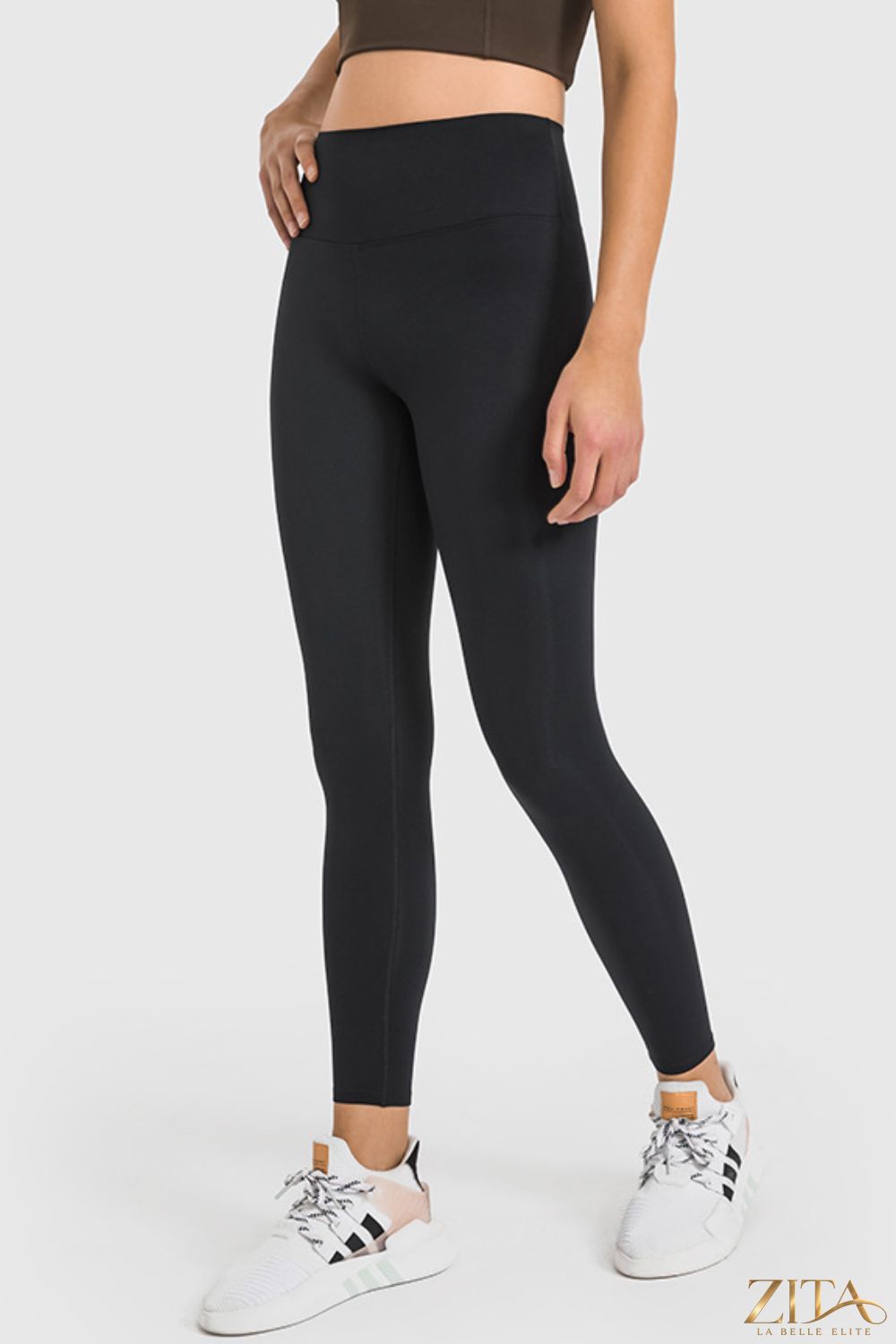 Zita La Belle Elite Millennia high waist ankle-length yoga leggings shown in dark color with a snug fit and flexible fabric.