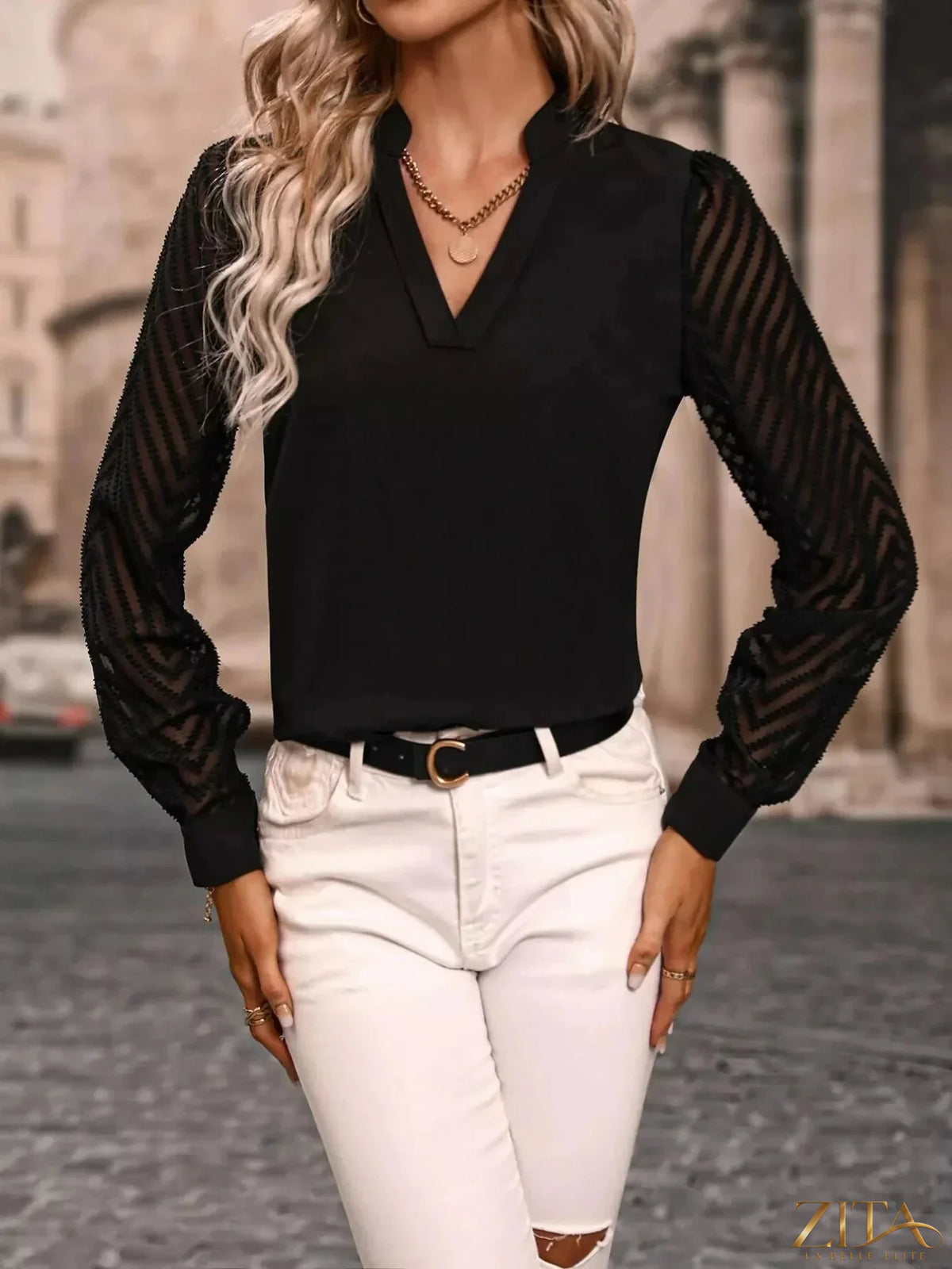 Zita La Belle Elite sheer sleeve V-neck blouse with lightweight fabric and elegant design, shown on a model.