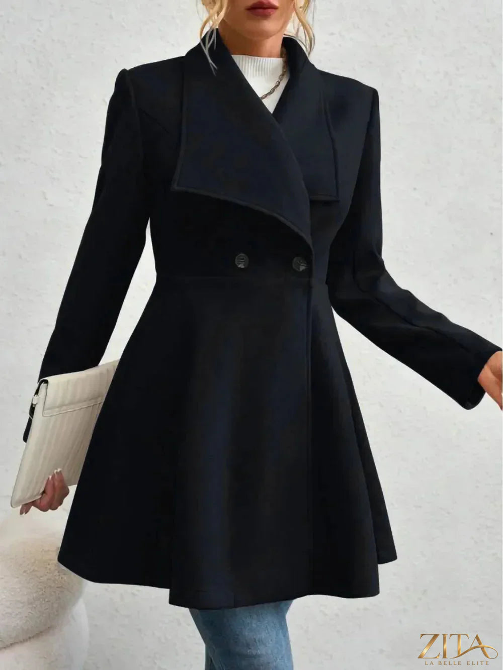 Zita La Belle Elite collared neck button-up long sleeve coat hanging on a hanger, showcasing its classic design and tailored fit.