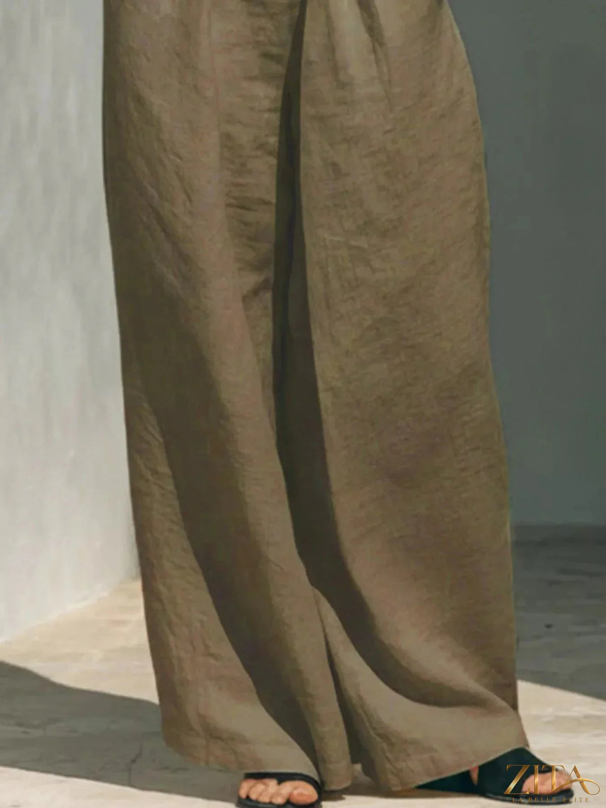 Plus size Zita La Belle Elite turtleneck sleeveless top and wide-leg pants set, featuring a coordinated stylish outfit.