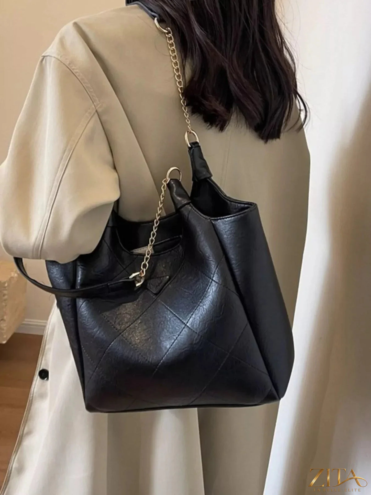 Trendsi PU leather shoulder bag with sleek design, featuring a spacious interior and adjustable strap for versatile style.