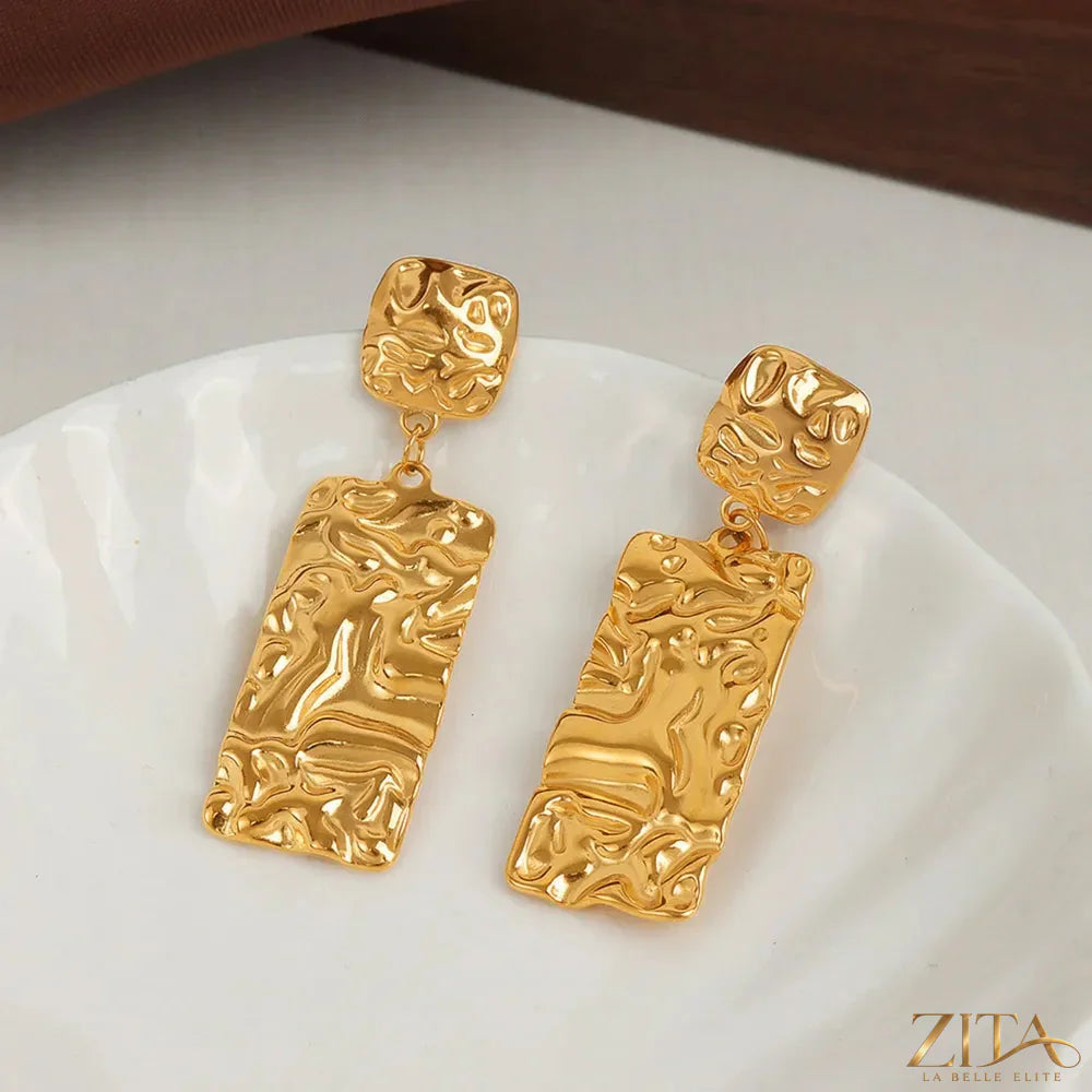 Titanium steel textured geometric earrings by Zita La Belle Elite, showcasing modern, angular design with a metallic finish.