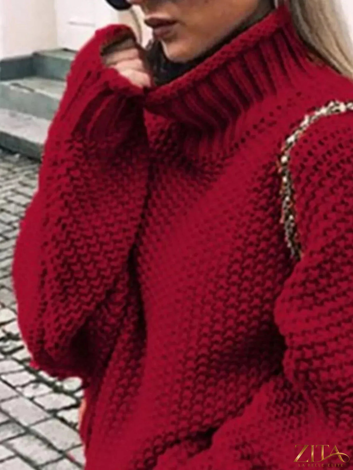 Zita La Belle Elite chunky knit turtleneck sweater in cozy cream with thick ribbed collar and textured knit pattern.