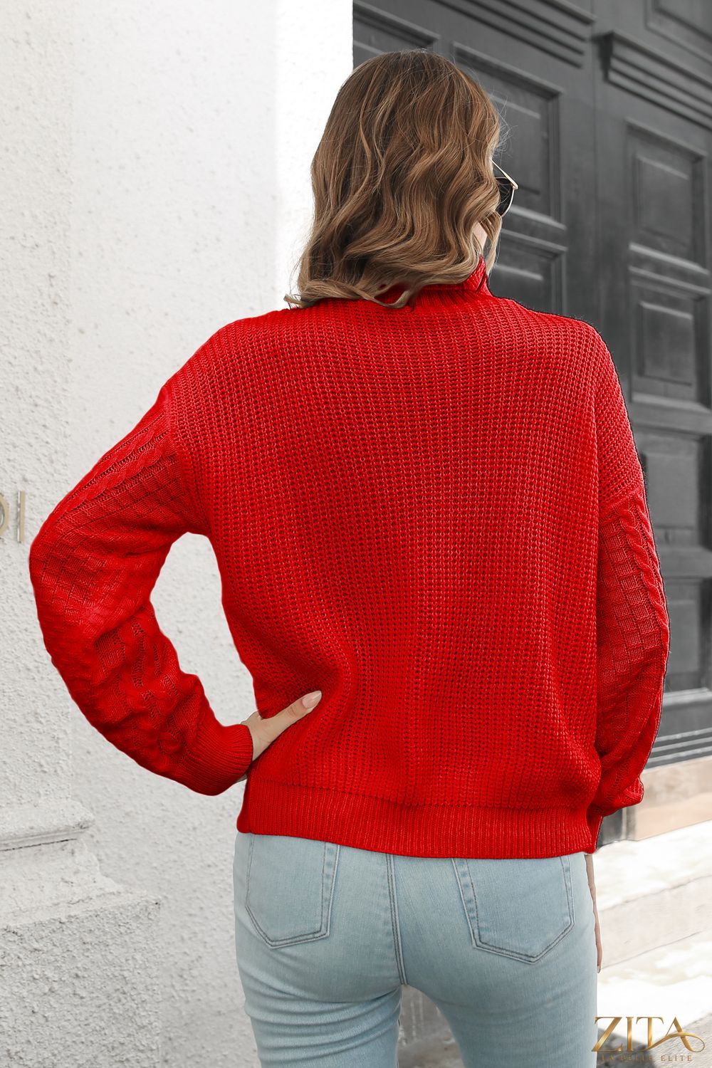 Zita La Belle Elite cable-knit turtleneck sweater in cozy knit fabric, featuring a high turtleneck and textured cable pattern.