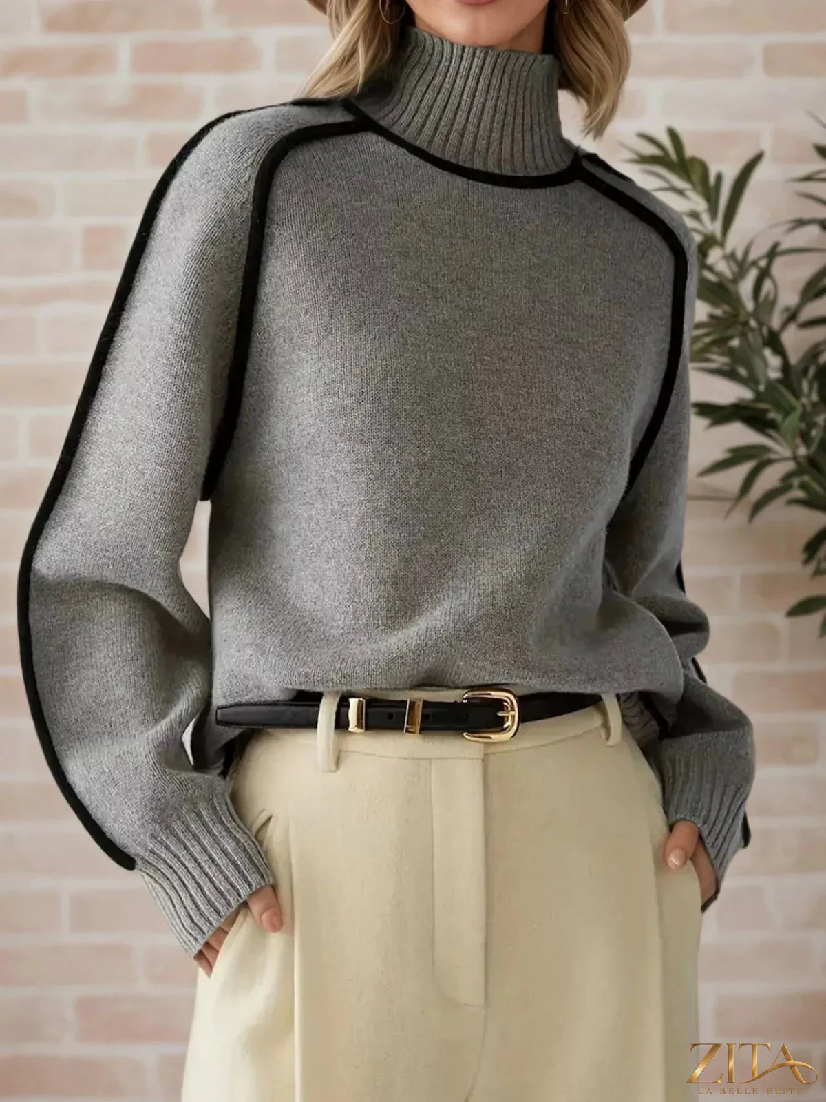 Zita La Belle Elite contrast trim turtleneck sweater featuring a fitted design with bold color accents and a classic turtleneck collar.