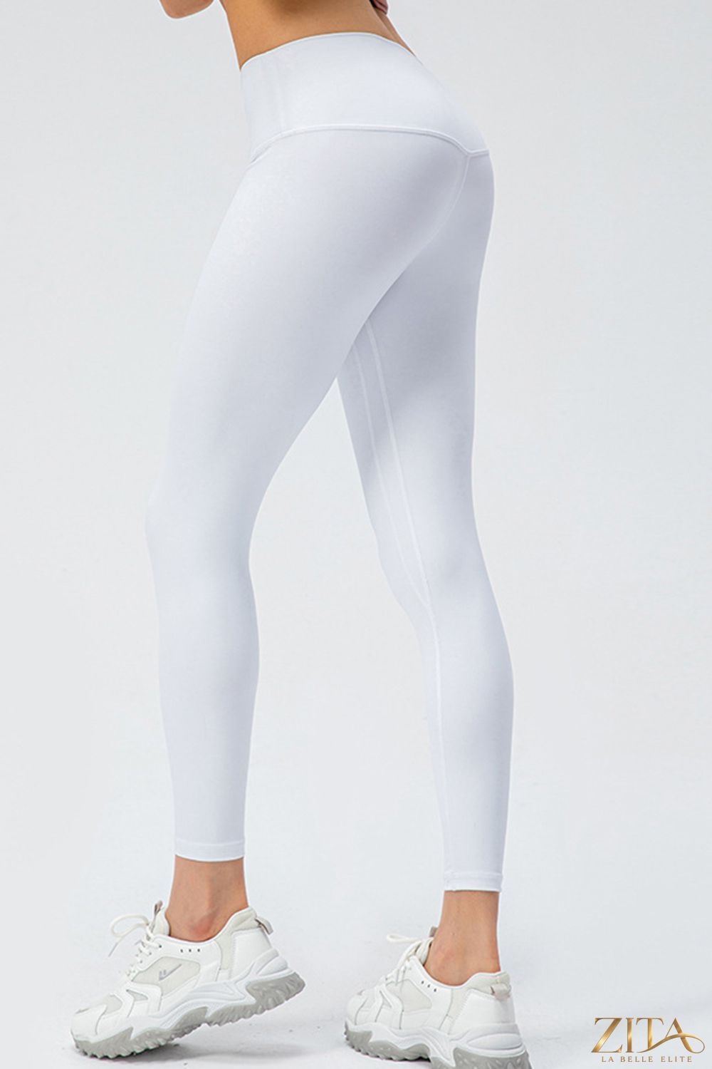 Trendsi wide waistband slim fit active leggings in black, showing close-up of stretchy fabric and comfortable fit.