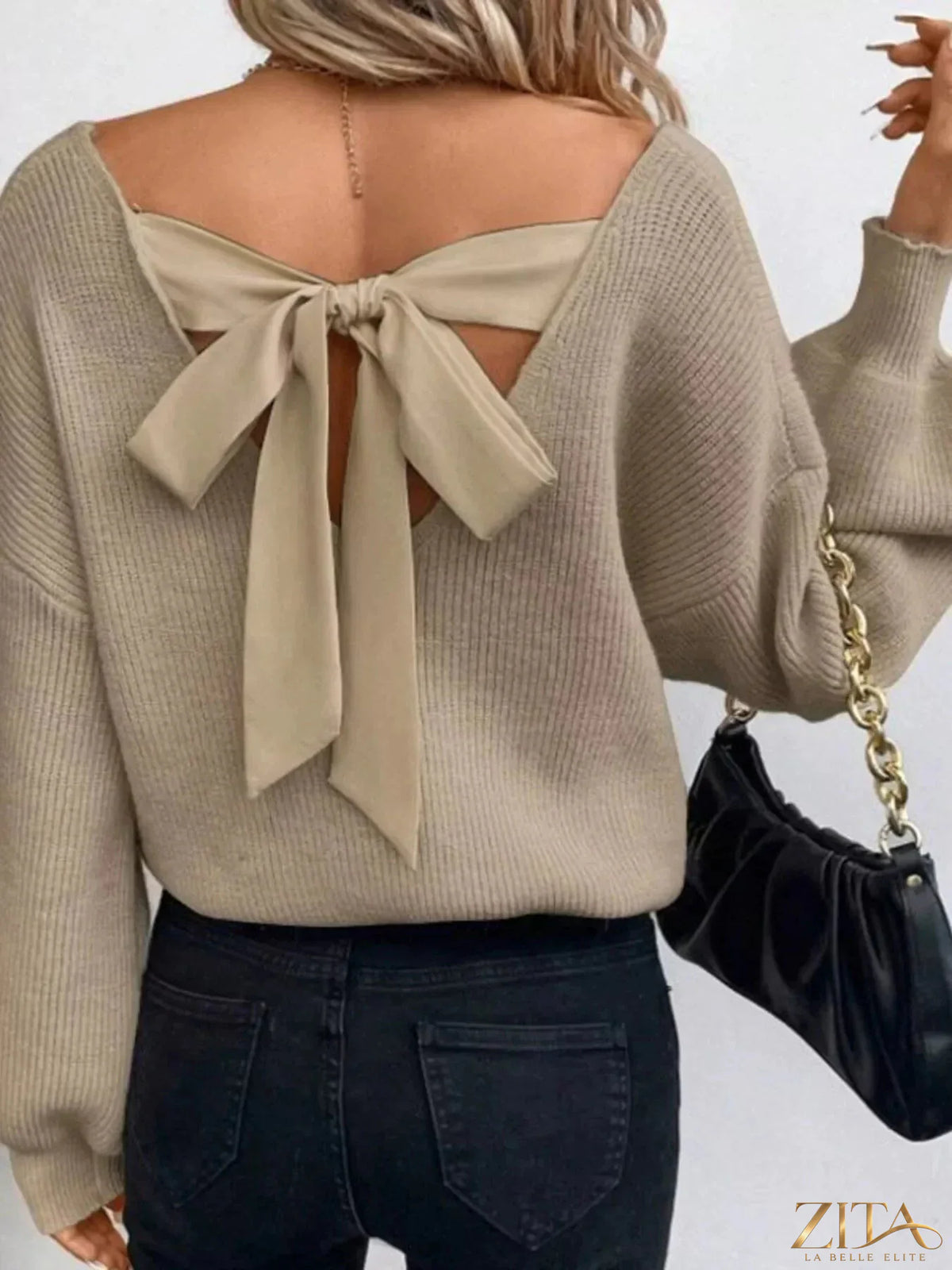 Zita La Belle Elite back bow V-neck sweater in soft knit fabric with a stylish bow detail at the back and a V-neckline.