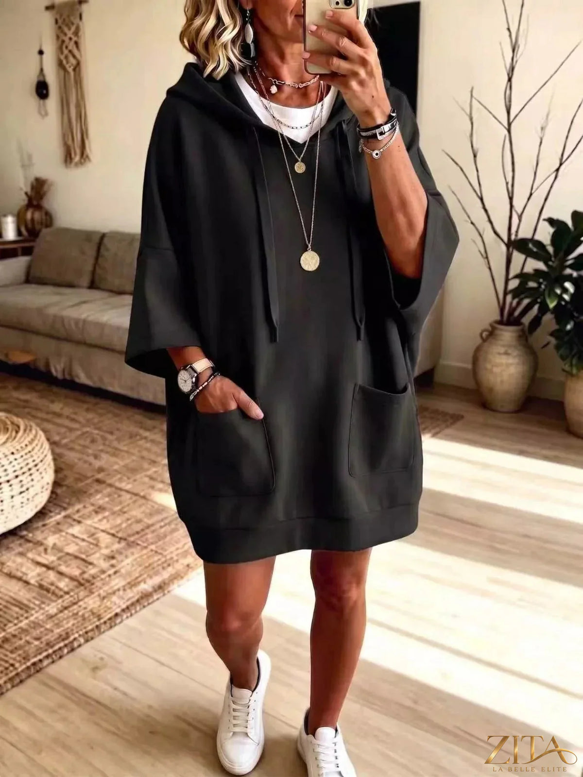 Plus size oversized drawstring hoodie by Zita La Belle Elite with front pockets, soft fabric, and relaxed fit.