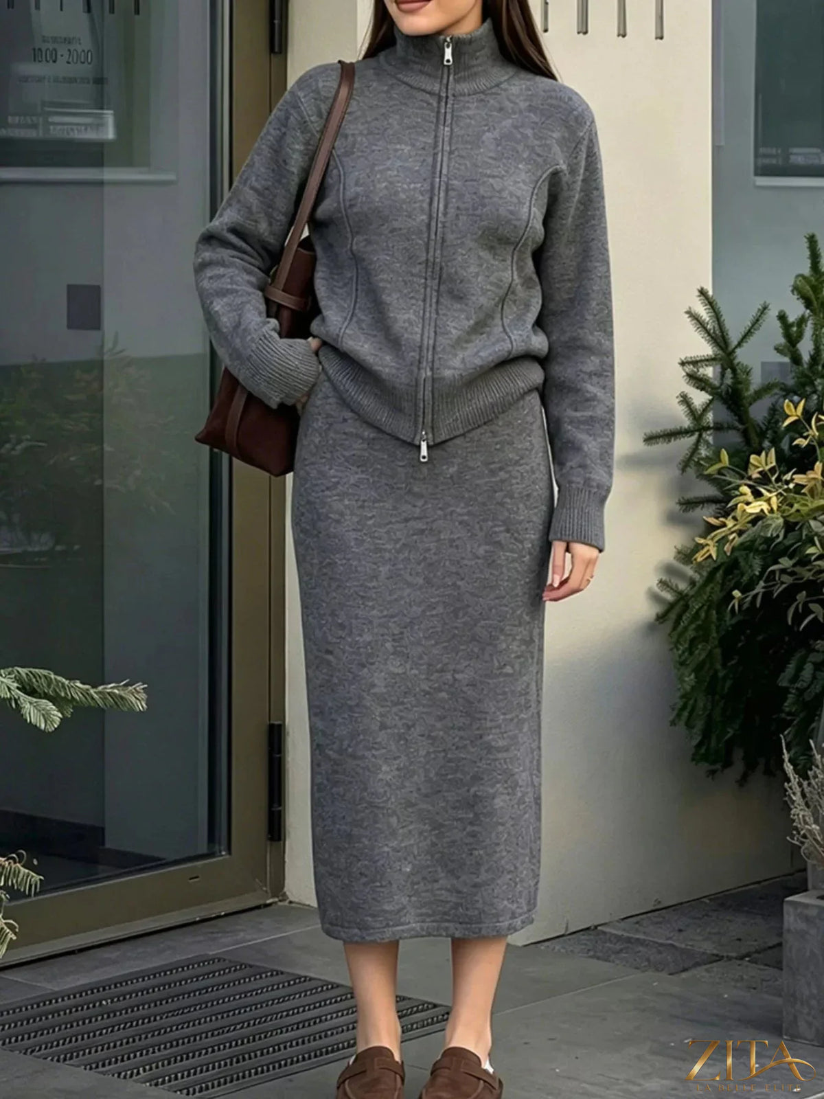 Zita La Belle Elite zip-up mock neck cardigan and matching midi skirt sweater set, in soft knit fabric, displayed on a model.