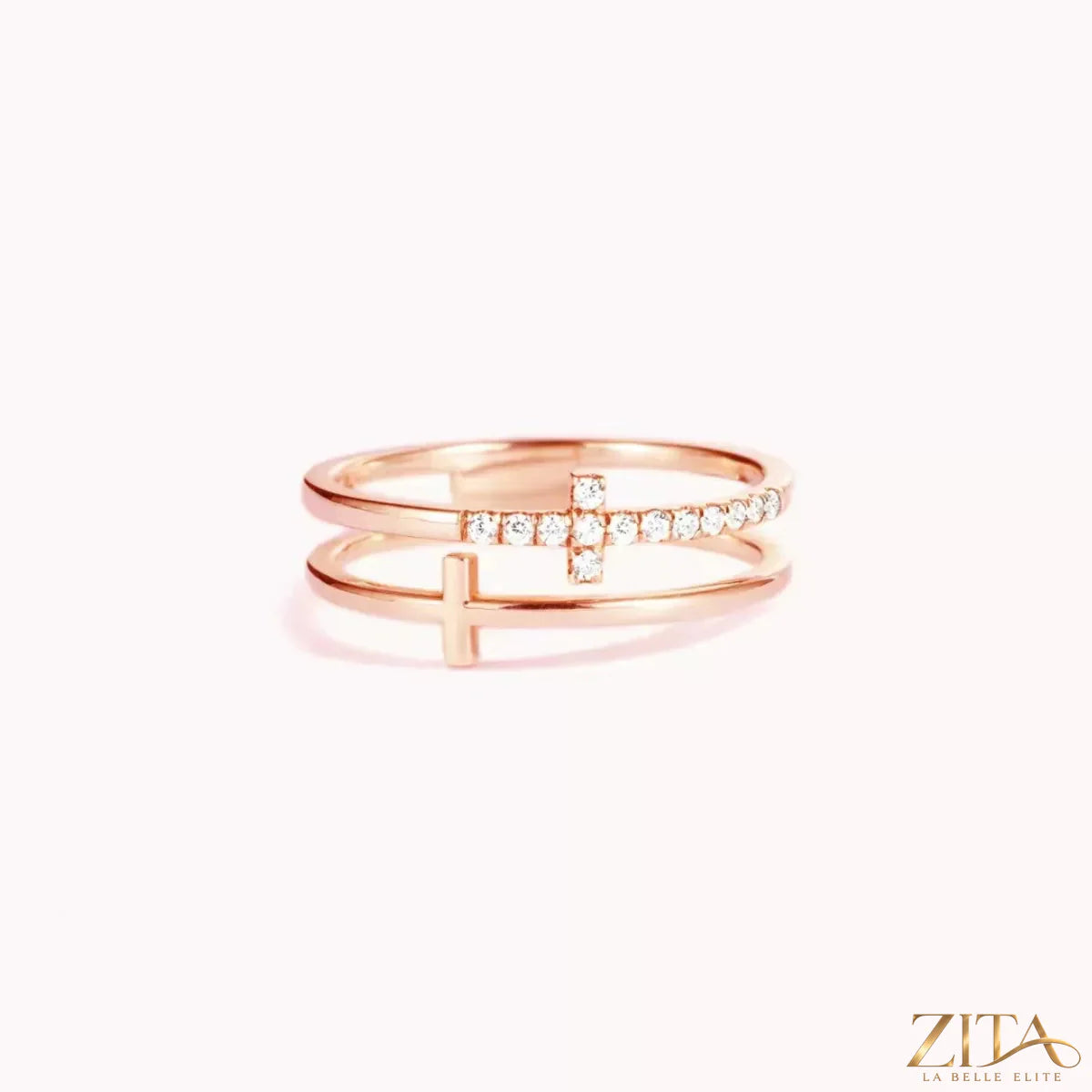 Zita La Belle Elite double band cross ring with intertwined silver bands and a sleek cross design on a white background.