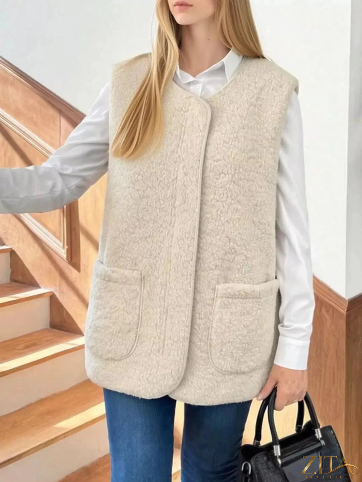 Zita La Belle Elite Sherpa sleeveless vest coat featuring soft, plush fabric and a stylish sleeveless design for cozy layering.
