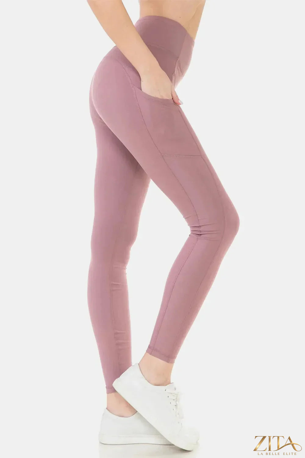 Black high waist leggings with wide waistband from Trendsi, featuring a snug fit and stretchy fabric for comfortable wear.